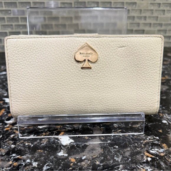 kate spade Handbags - Kate Spade Cream Pebbled Wallet
